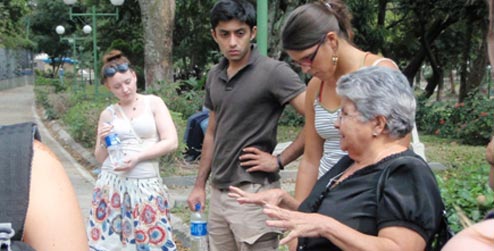 Maudre Guadelupe talks to ICS volunteers